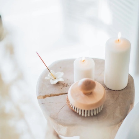 White Candles on Wood Table